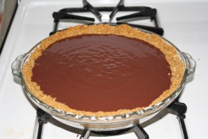 Mix pudding packet with 2 1/2 cups of milk. Whisk for 2 minutes. Pour pudding into pie shell and place in refrigerator for 45 minutes to set up.