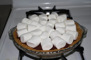 Turn on broiler. Arrange marshmallows in one even layer on top of pie filling.