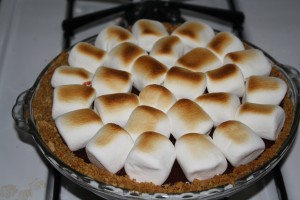 Place pie in oven under broiler to toast marshmallows. Watch VERY closely! It only takes a few seconds to go from white marshmallows to a scorched mess.
